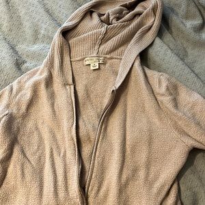 Cozy and warm sweater. Smoke free home. Fits more like a small.